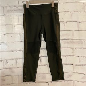 Dark green leggings with gold shimmer